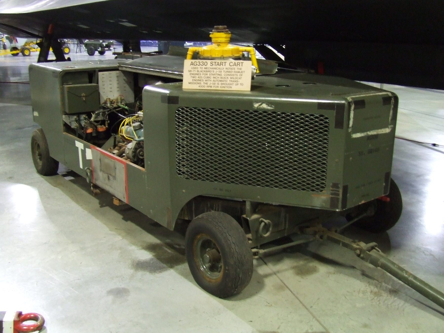 A start cart at the Hill Aerospace Museum, Utah, which calls it the AG330. A drive shaft from the cart spins the engine through its gearbox.