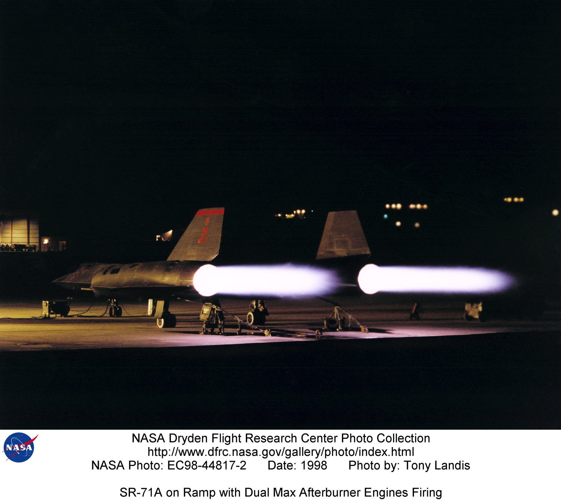 A NASA SR-71A tied down on the ramp with both J58s in maximum afterburner during a ground run, 1998.